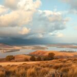 Krajina s teplomerom znázorňujúcim teplotu a oblačné počasie.