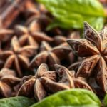 Klinčeky a listy byliniek na drevenom stole, zdravotné prínosy.